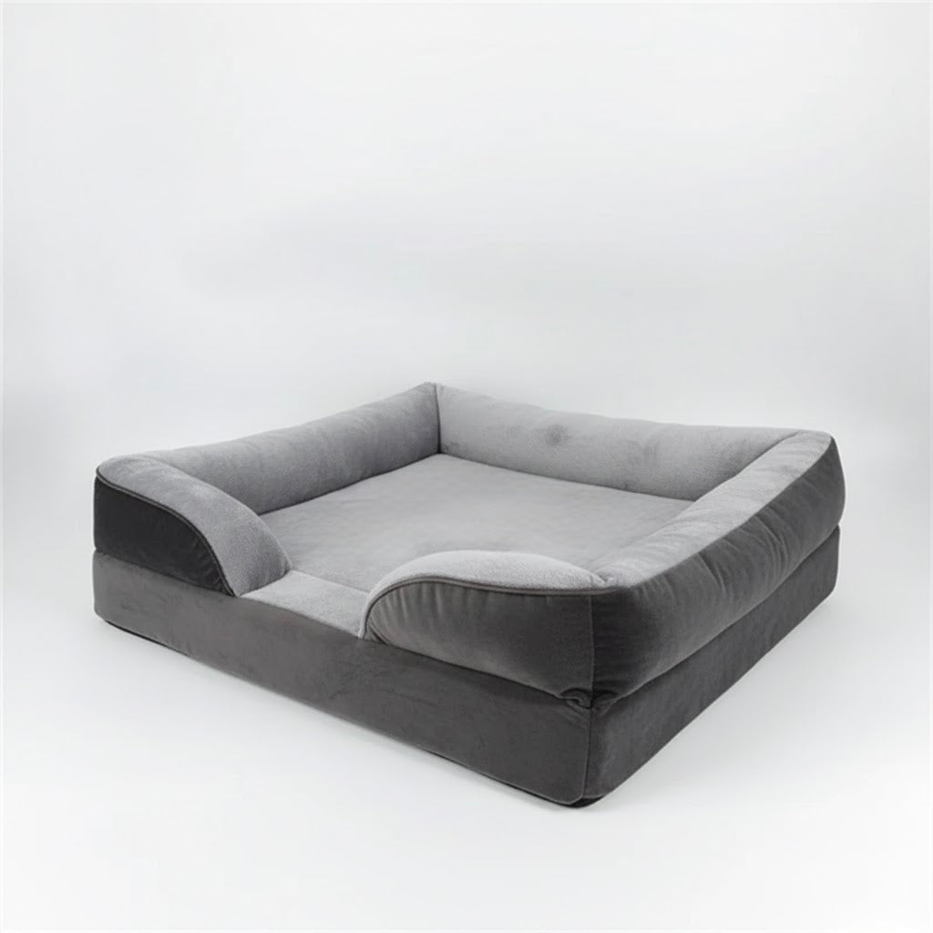 מיטת כלבים אורתופדית בצבע אפור עם משענות צד מרופדות – דגם יוקרתי ונוח לחיות מחמד.